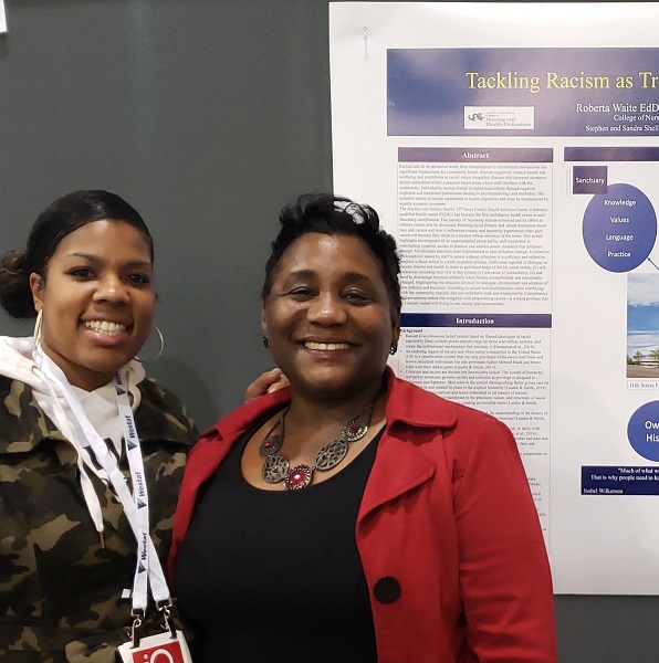 Roberta Waite, EdD, professor, associate dean for Community-Centered Health & Wellness and Academic Integration and director of Stephen & Sandra Sheller 11th St. Family Health Services and Taraya Gibson, RN case manager at 11th St.